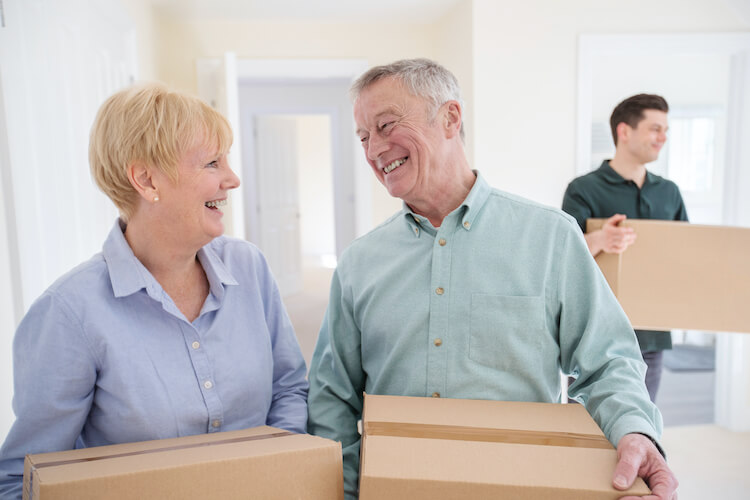 Senior couple downsizing their home for retirement.