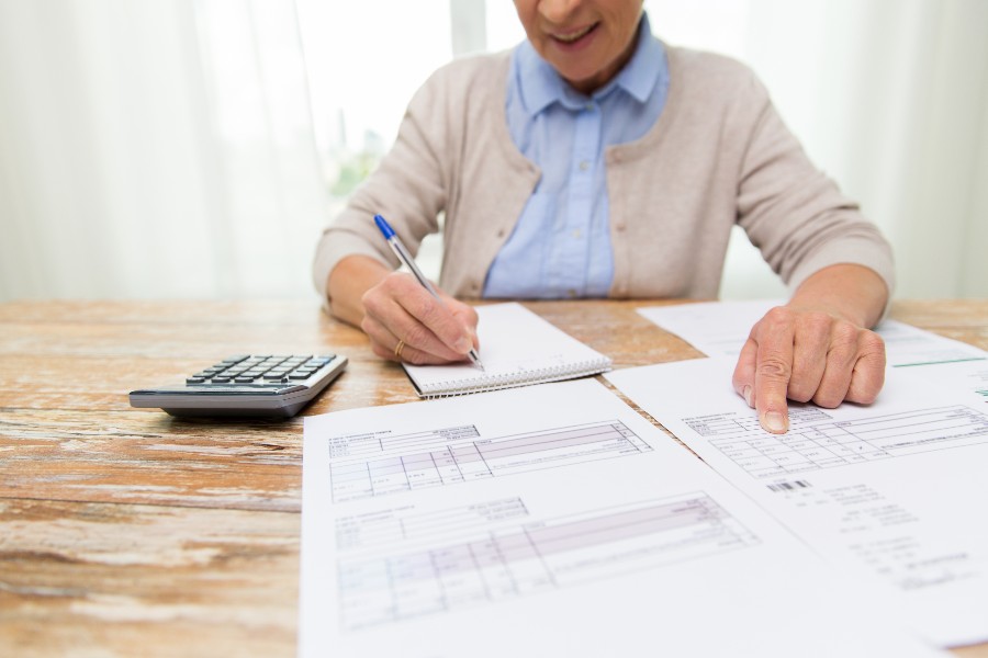 Woman updating her budget
